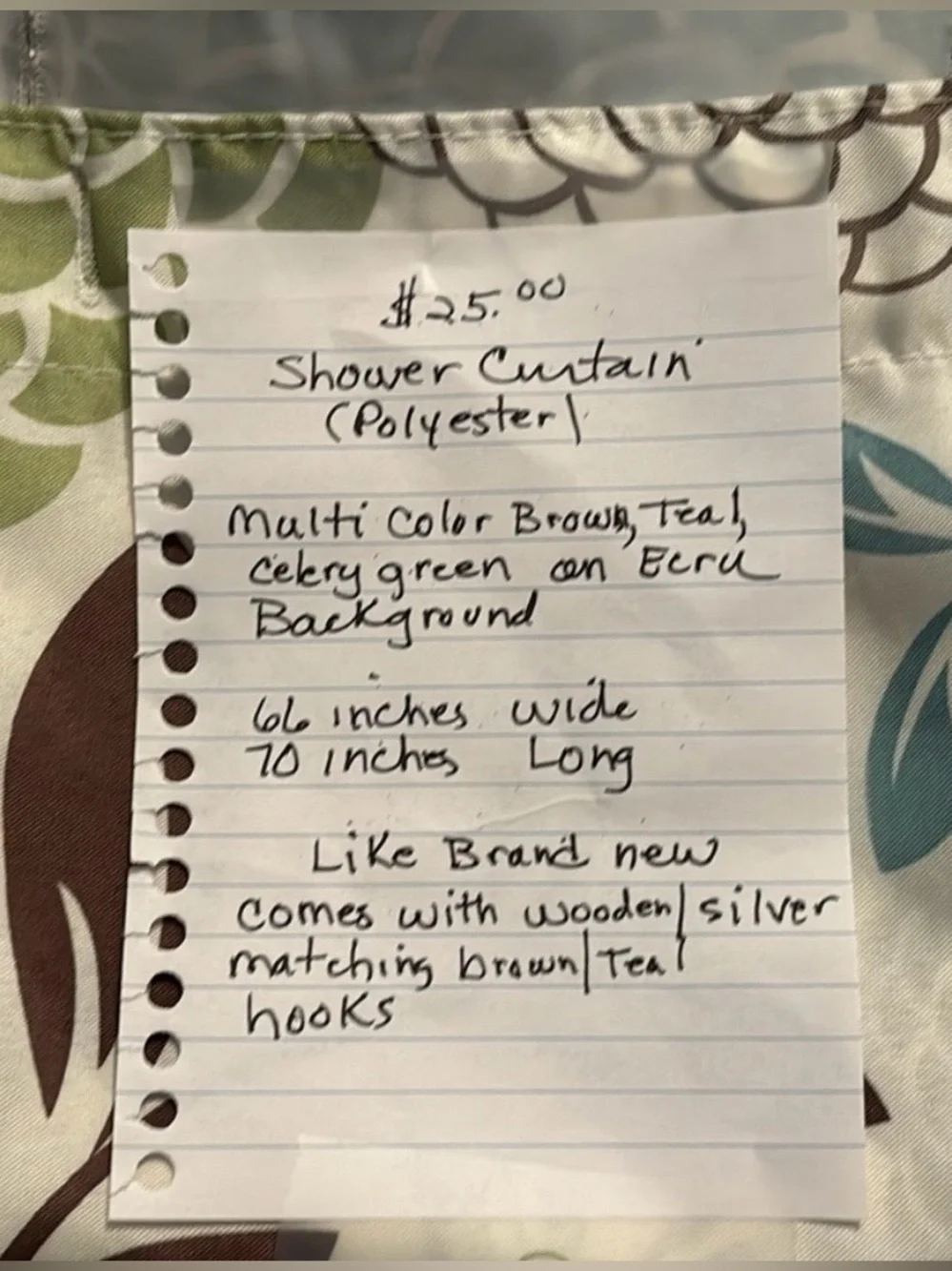 Shower curtain with shower hooks